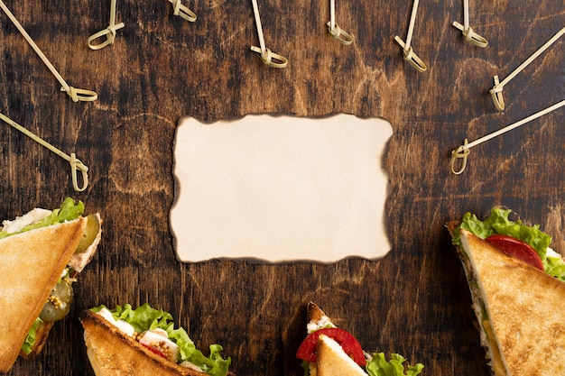 Top view of triangle sandwiches with paper