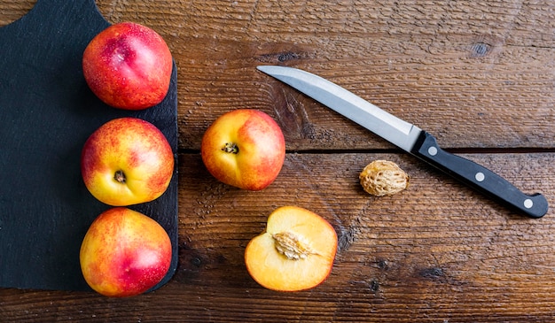 Top view tropical fruit and knife