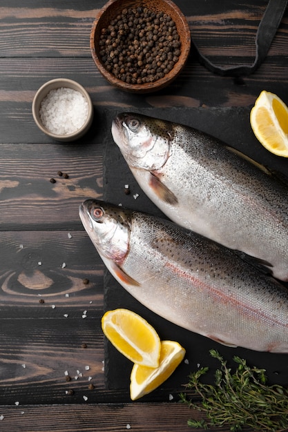 Free photo top view trout ready to be cooked