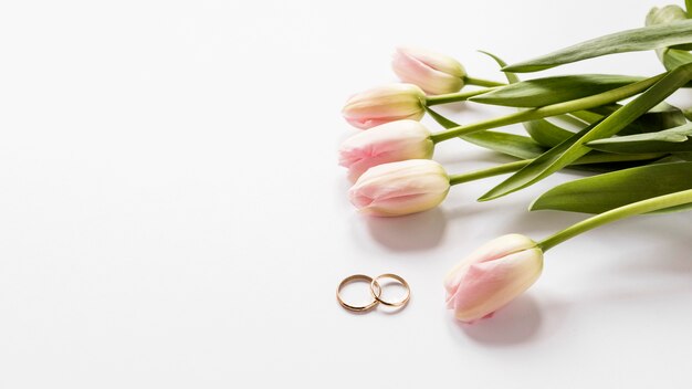 Top view tulips and engagement rings