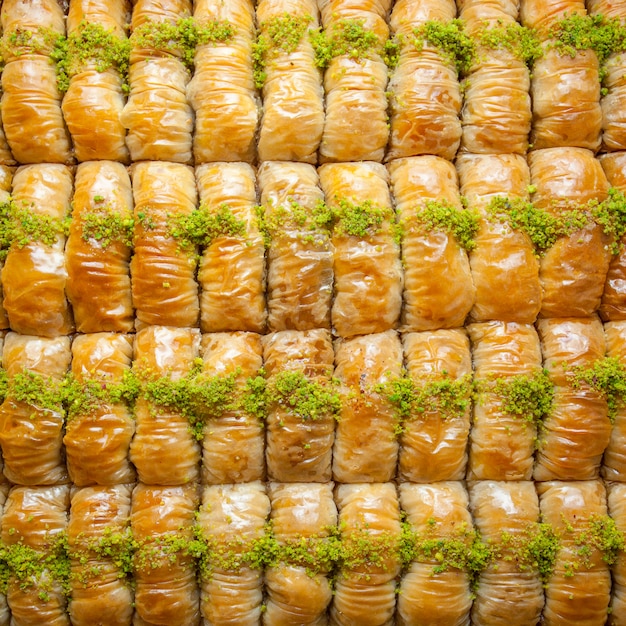 Free photo top view turkish baklava pattern dessert made of thin pastry, nuts and honey