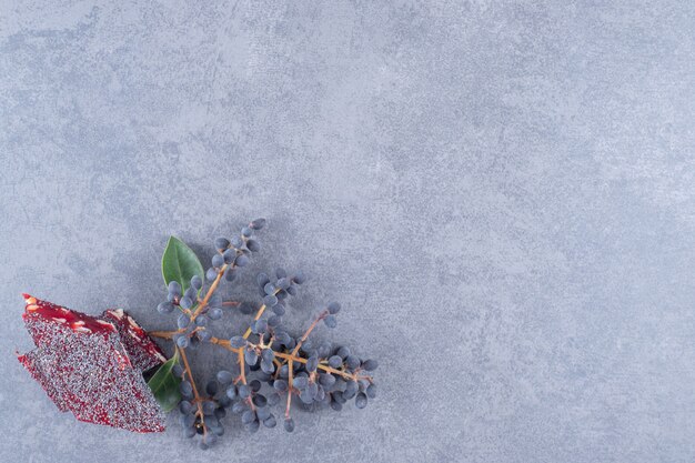 Top view of Turkish delight rahat lokum on grey background.