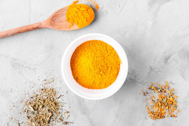 Free photo top view of turmeric condiment concept