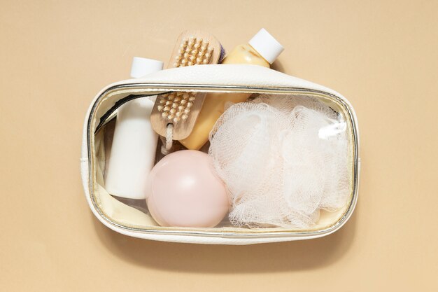 Top view vanity case and items on table