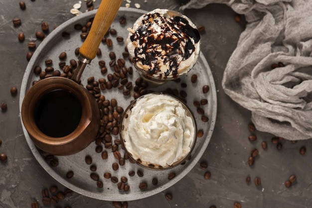 Top view variety of drinks with cream