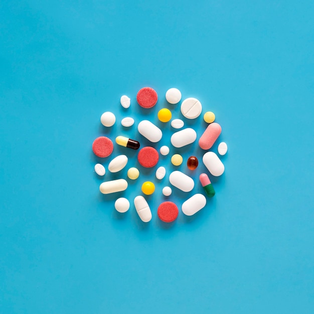 Free photo top view of variety of pills in circle shape