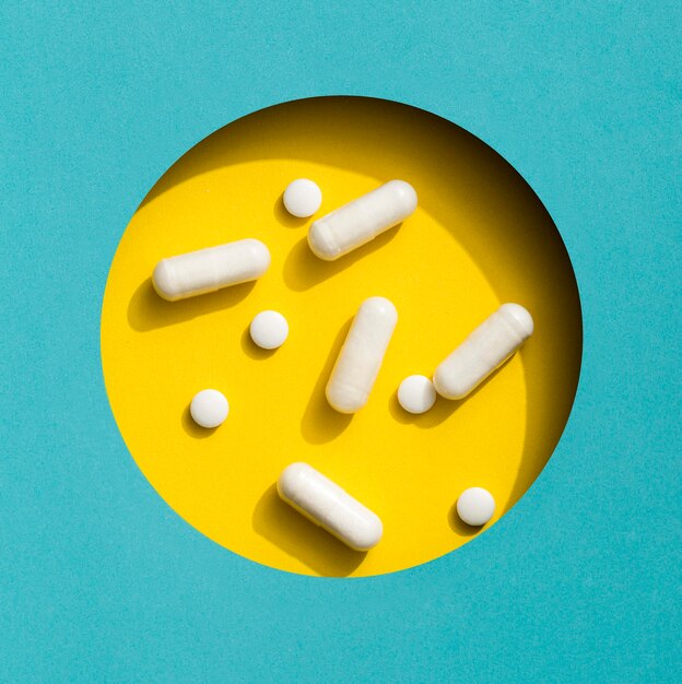 Top view of variety of pills in circle