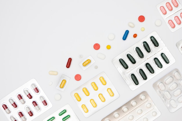 Top view of variety of pills in foils