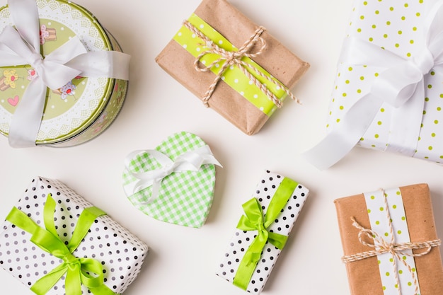 Top view of various gift boxes wrapped in design paper