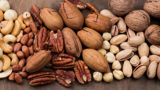 Top view various organic nuts snack background