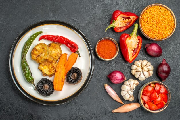 Top view vegetables an appetizing dish lentil tomatoes spices bell peppers garlic onion