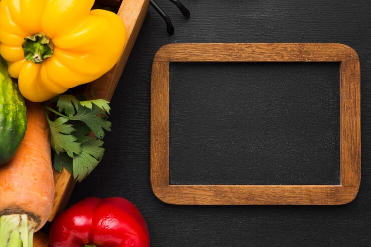 Free Photo top view vegetables assortment with frame