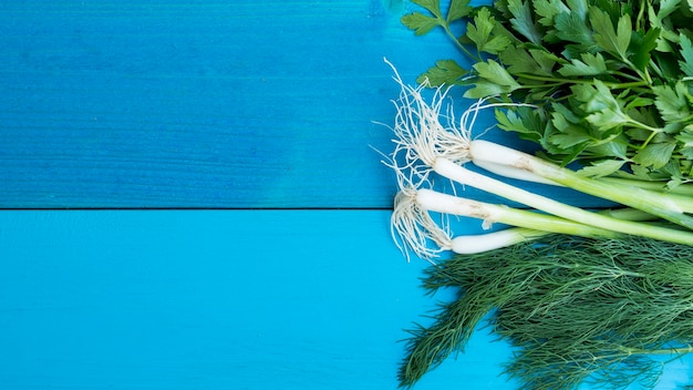 Top view vegetables on blue background