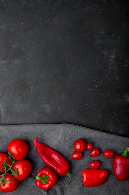 Top view of vegetables on cloth on black surface