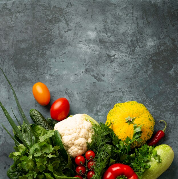 Top view vegetables on stucco background