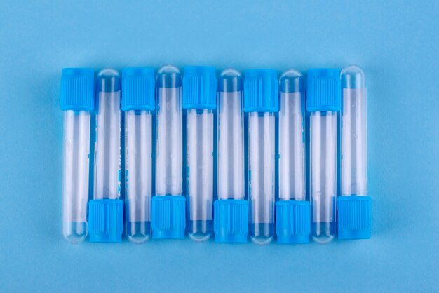 Top view vials on blue background