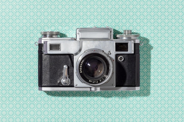 Free photo top view vintage camera composition