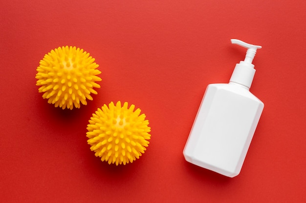 Top view of viruses with liquid soap bottle