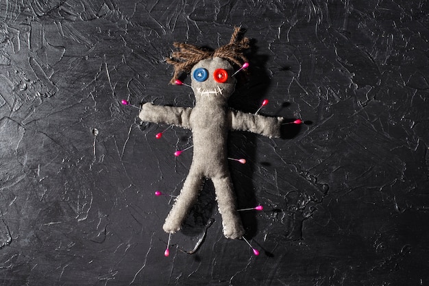 Top view vodoo doll with pins