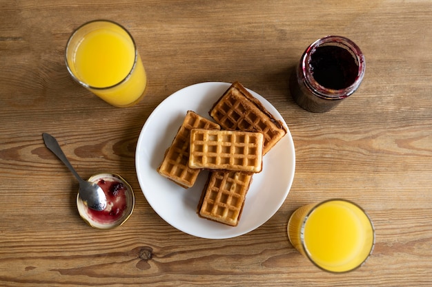 Free photo top view waffles on plate arrangement