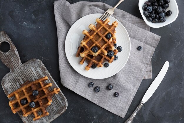 Top view waffles with blueberries