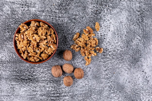 Top view walnuts in bowl on stone  horizontal