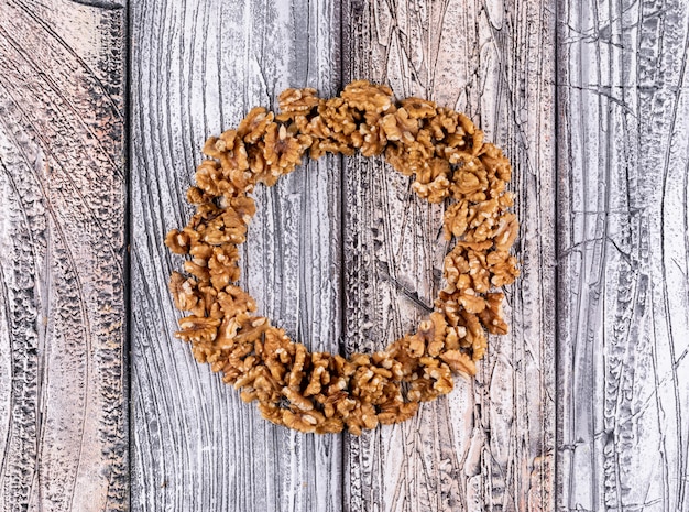 Top view walnuts circle shaped on wooden  horizontal