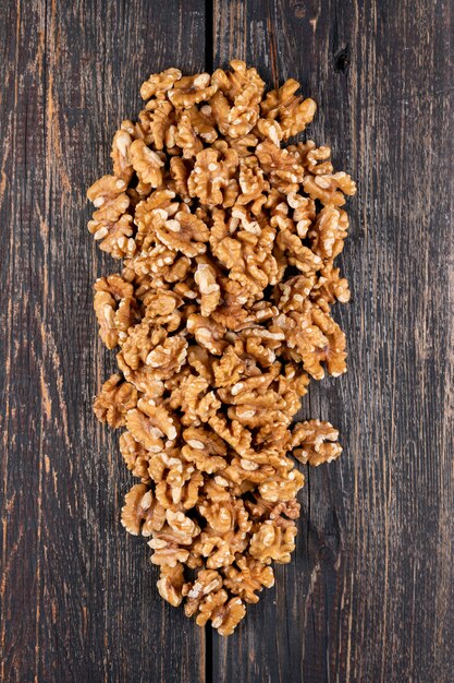 Top view walnuts on wooden  vertical