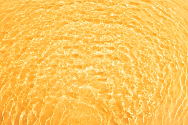 Top view water texture on orange