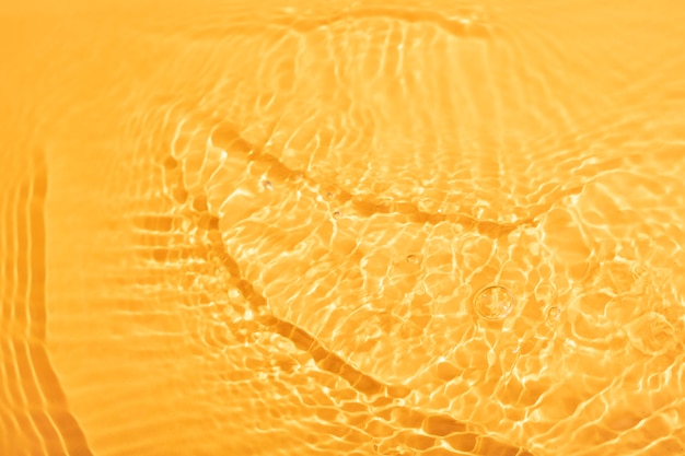 Top view water texture on orange