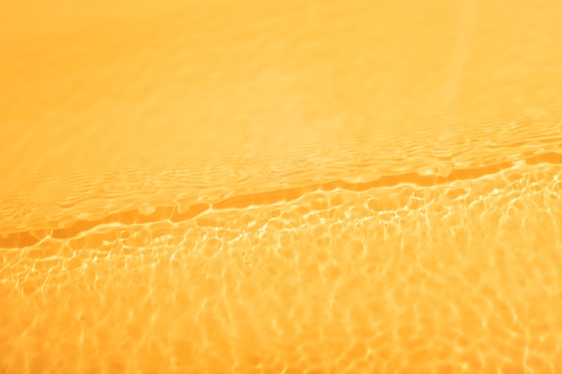 Top view water texture on orange