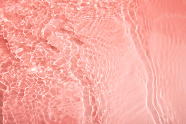 Top view water texture on pink