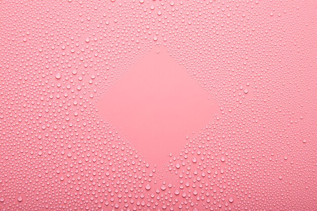 Top view water texture on pink