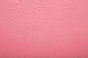 Free photo top view water texture on pink