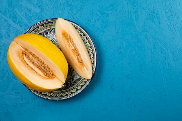 Free photo top view of watermelon in plate with copy space