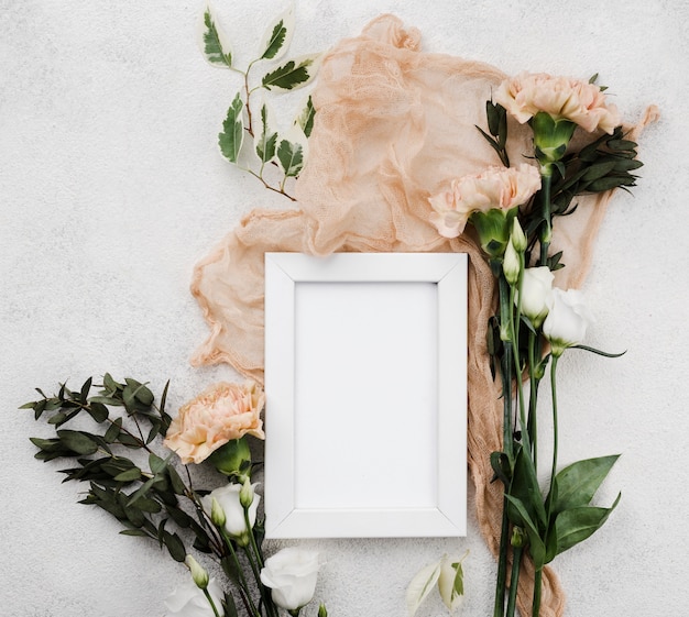 Free photo top view wedding flowers with frame concept