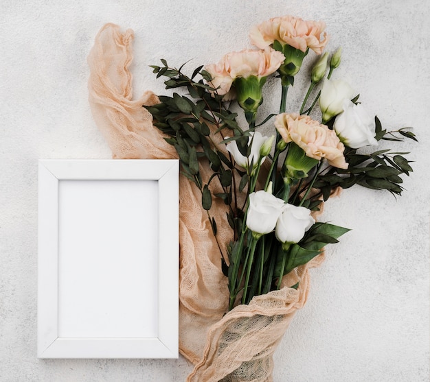 Free photo top view wedding flowers with frame