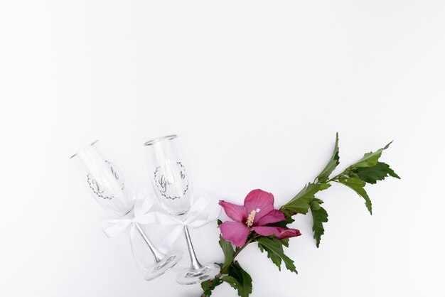 Top view wedding glasses with a flower 