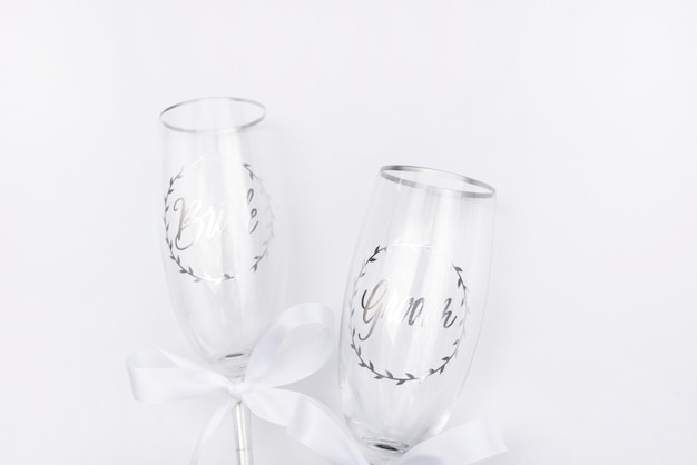 Free photo top view wedding glasses with white background