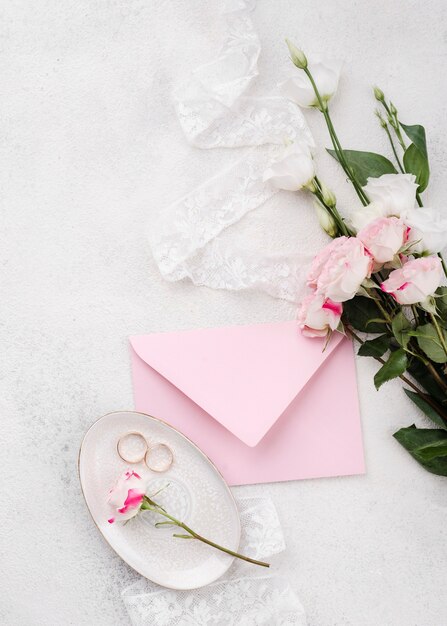 Top view wedding invitation card with flowers