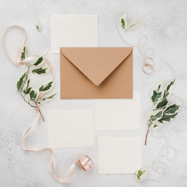 Top view wedding invitation cards on the table