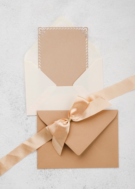 Top view wedding invitation cards on the table