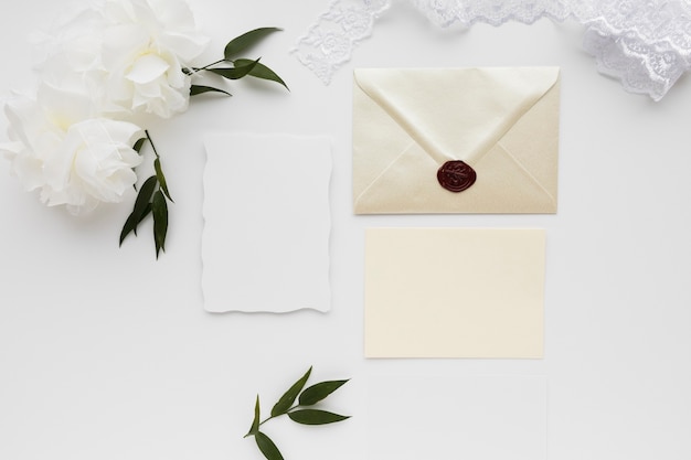 Free photo top view wedding ornaments and invitation card