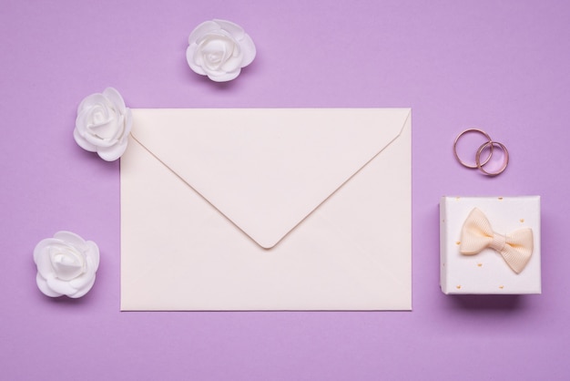 Top view wedding rings with envelope