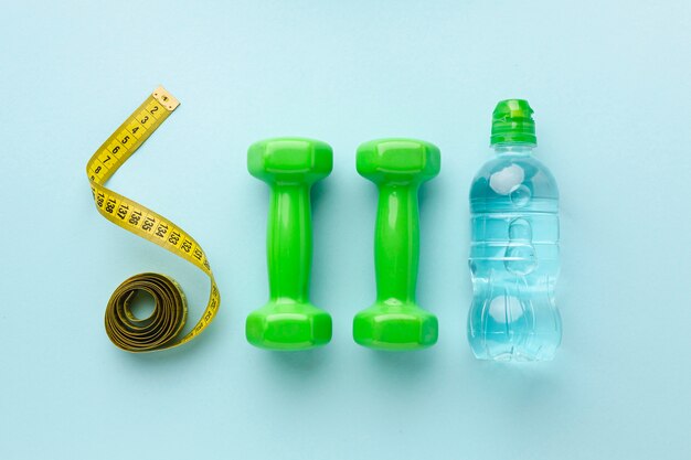 Top view weights meter and bottle of water