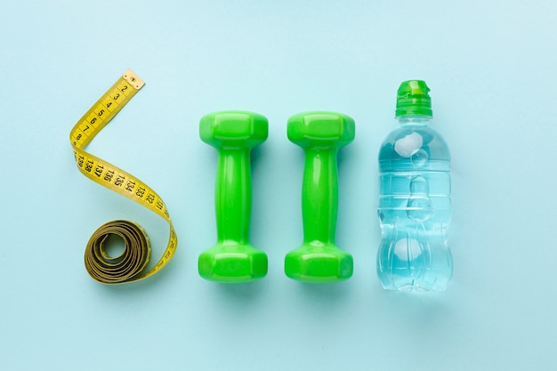 Top view weights meter and bottle of water