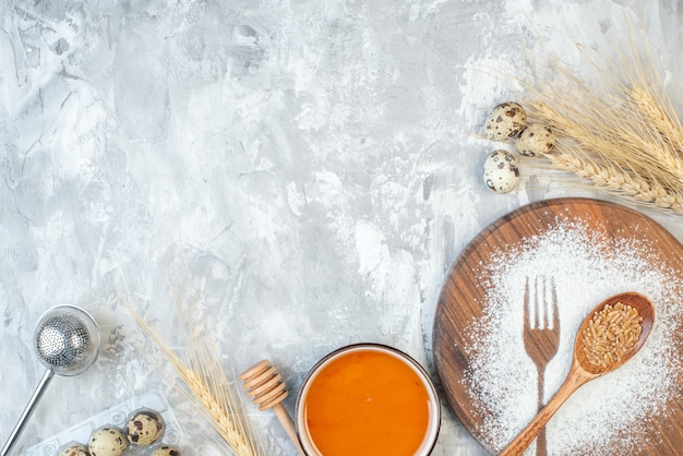 Top view white flour in fork and spoon shape on a light table cake sweet dough color sugar tea dessert biscuit bake