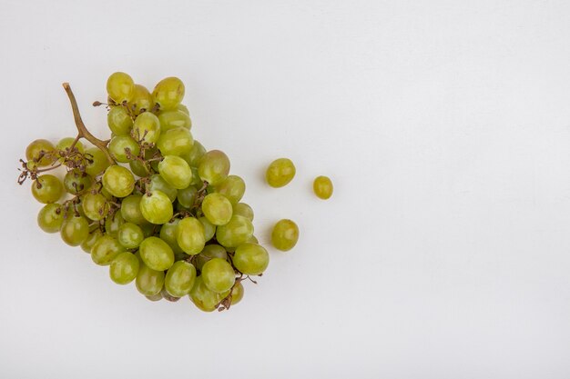 Top view of white grape on white background with copy space