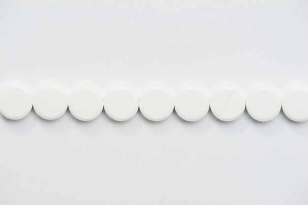 Top view white pills arrangement