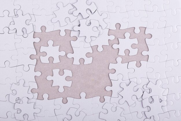 Top view white puzzle pieces arrangement